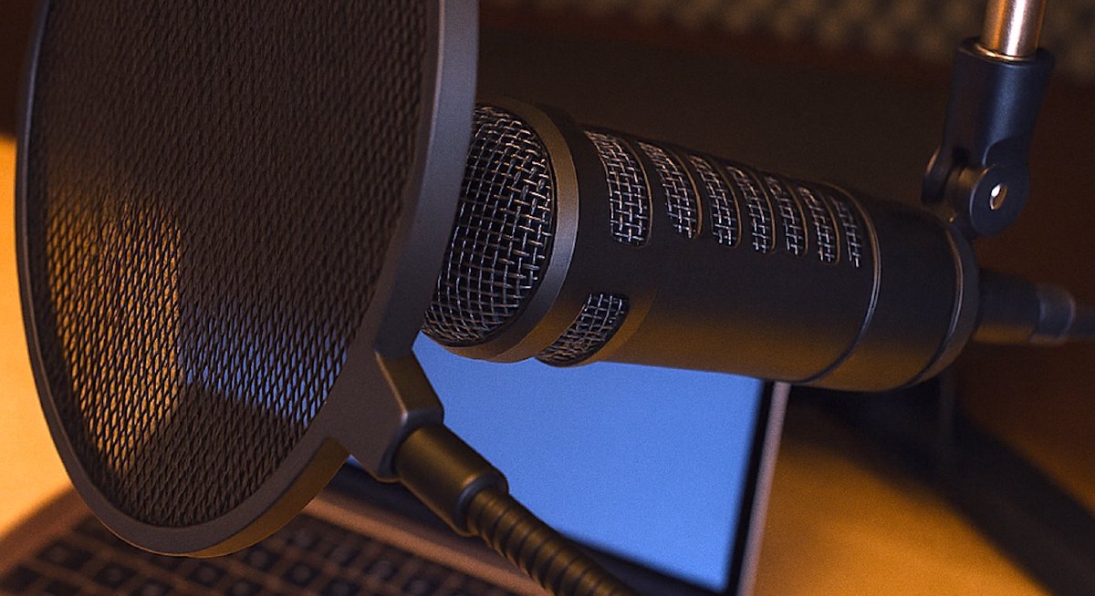 Okładka podcastu random:view - fotografia mikrofonu dynamicznego na tle ekranu LCD
